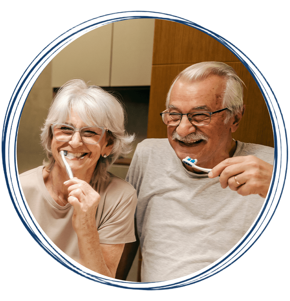 couple brushing teeth