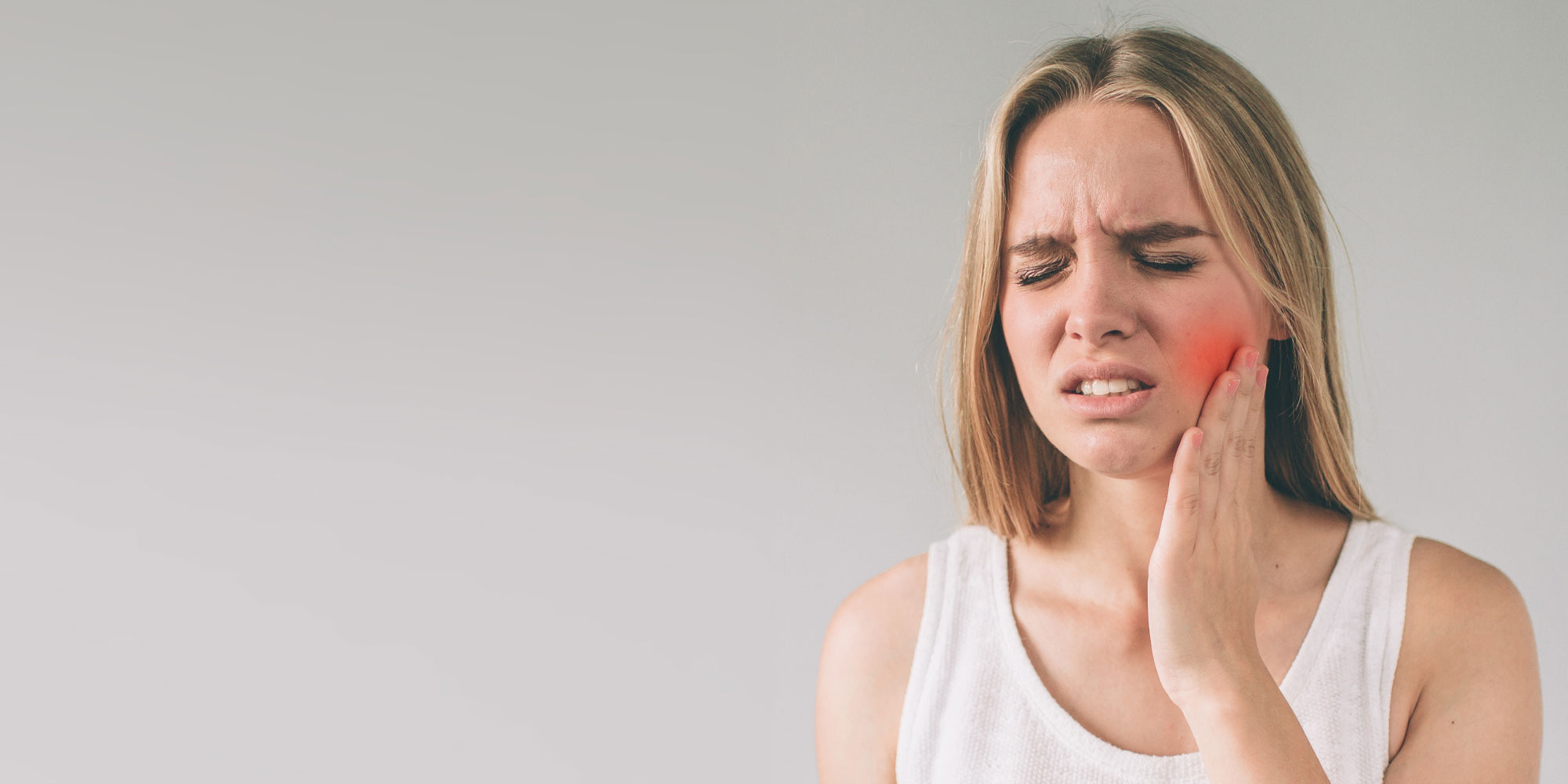 woman with tooth pain