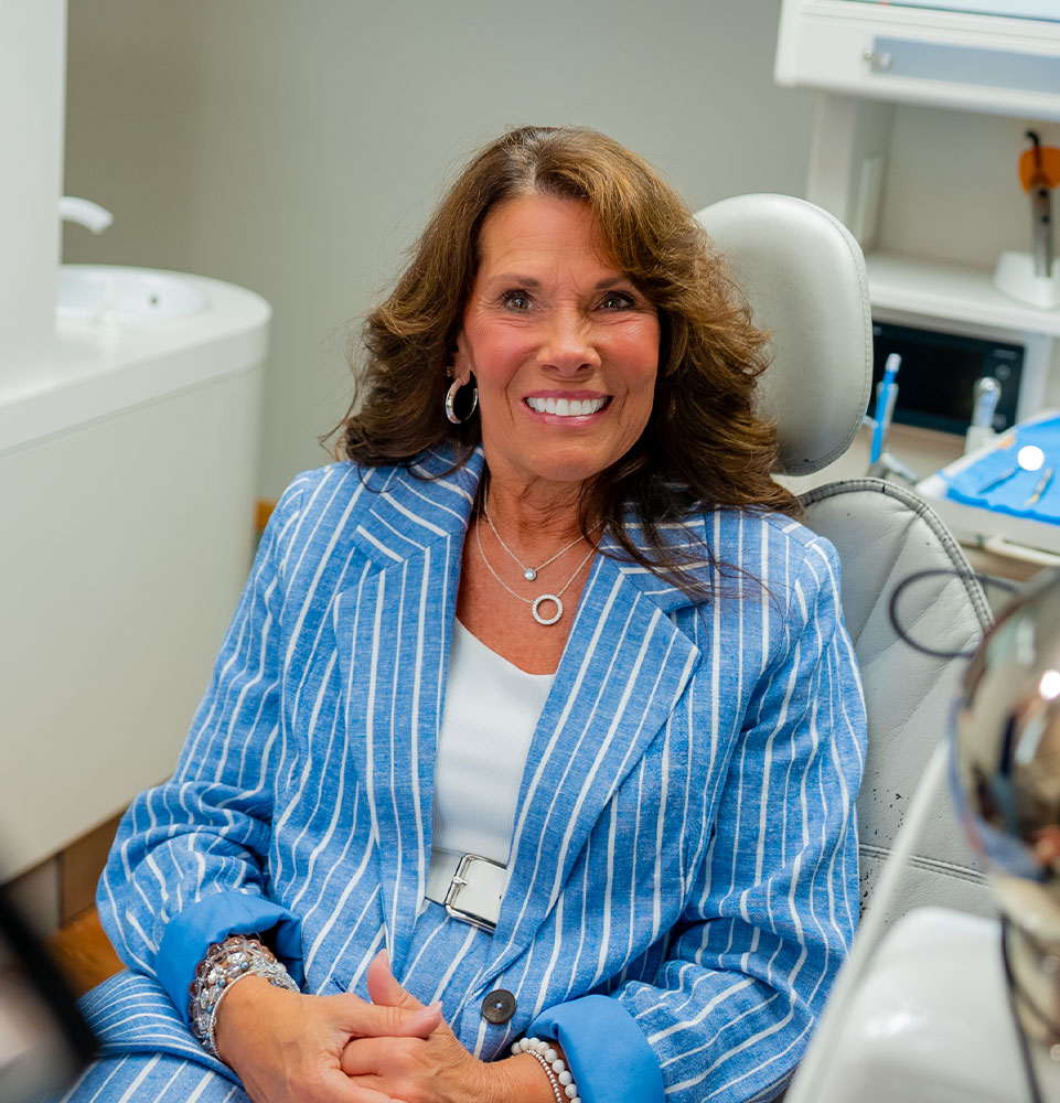 happy lady learning about dental work