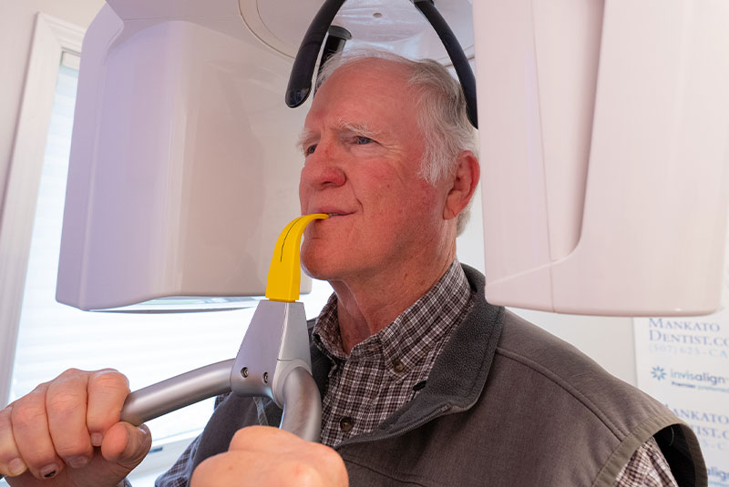 man getting cbct scan vest