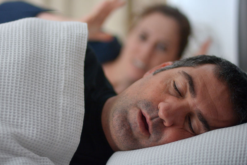 older man snoring