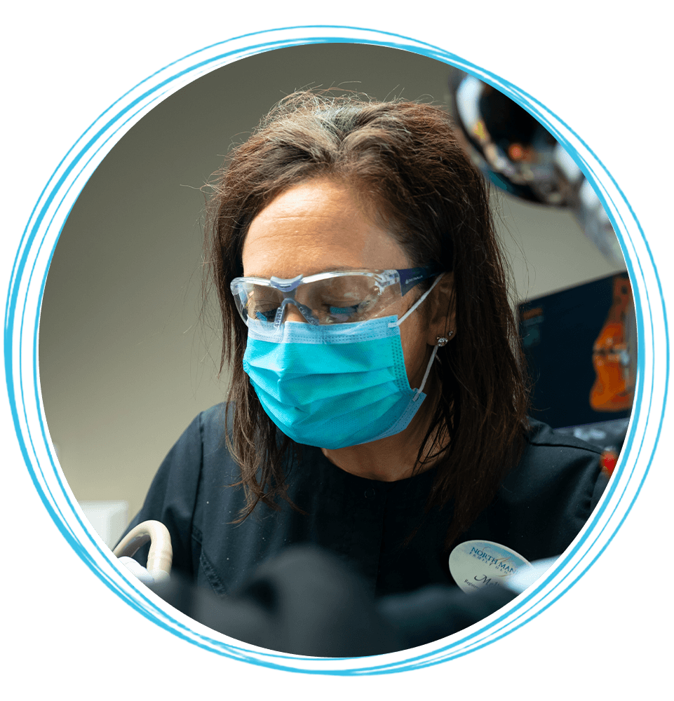 team with mask during procedure