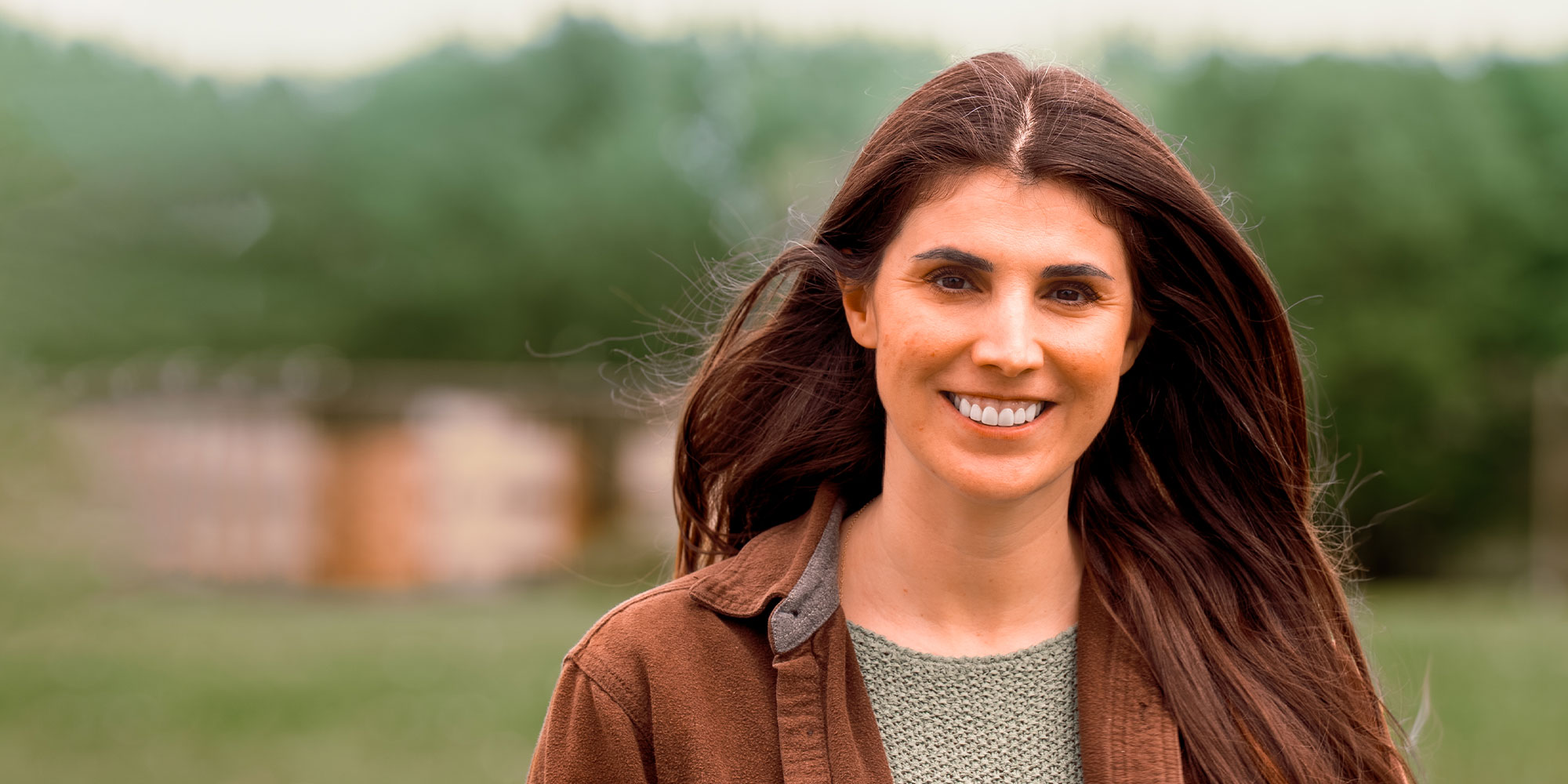 lady with brown jacket outside